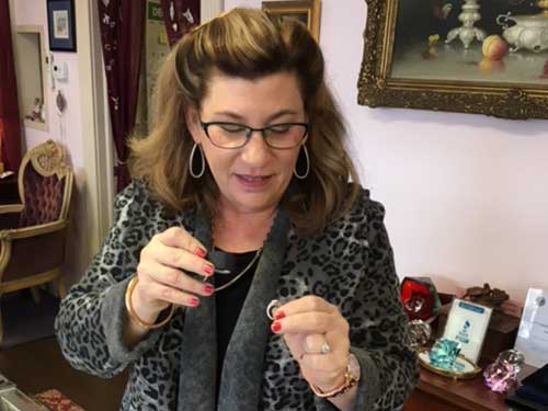 sarah with loupe - Sarah's Vintage & Estate Jewelry in Williamsville, NY